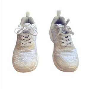 Nike Air white sneakers with subtle animal print pattern